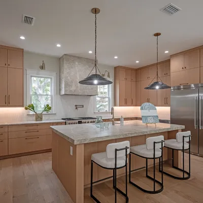 Kitchen island with quartzite counters and bar seating