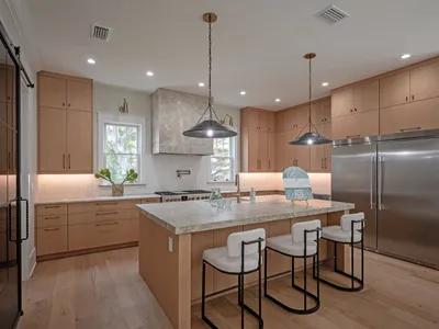 Kitchen island with quartzite counters and bar seating