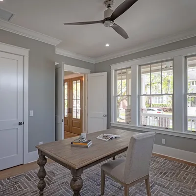 Study with bay windows overlooking the front porch and street